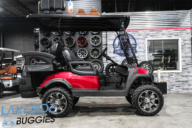 Red golf cart with black accents.
