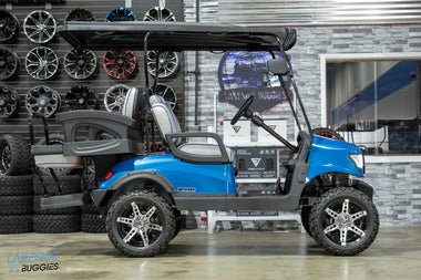 Blue lifted golf cart.