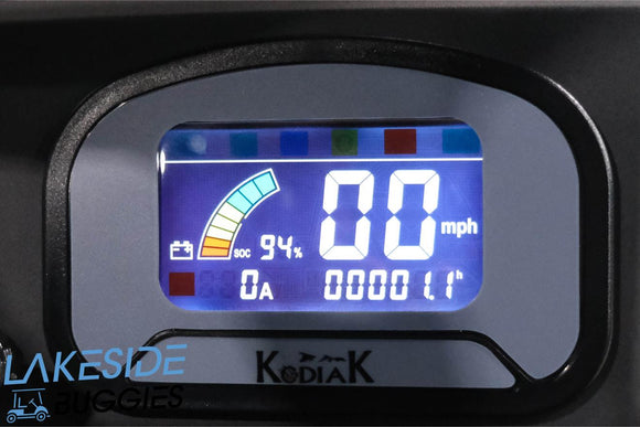 Digital display showing battery level, speed, and other metrics.