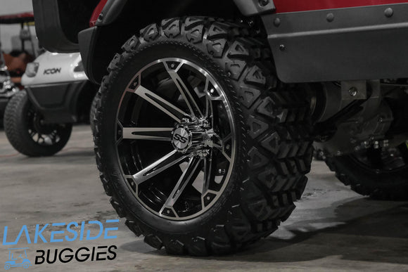 Golf cart tire with custom rim.