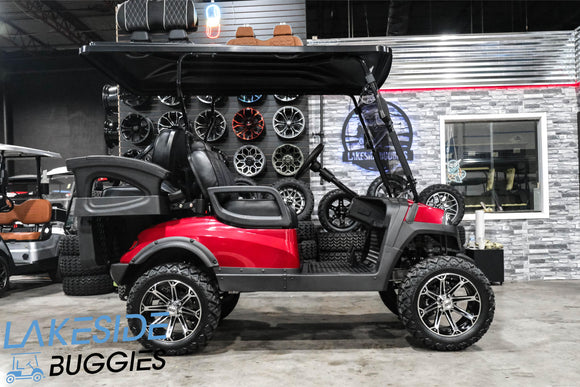 Red golf cart with black accents.