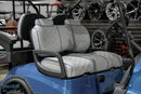 Blue golf cart with patterned seats.