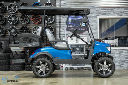Blue lifted golf cart.