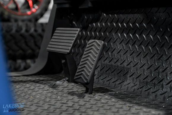 Black textured foot pedals.