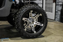 Golf cart tire with custom rim.