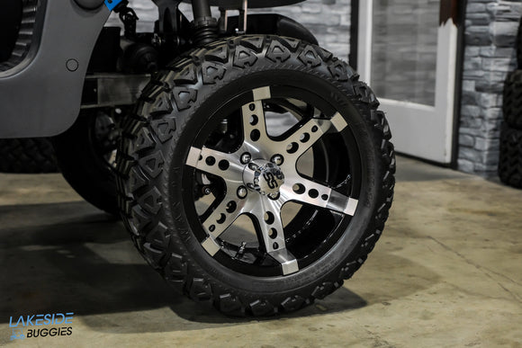 Golf cart tire with custom rim.