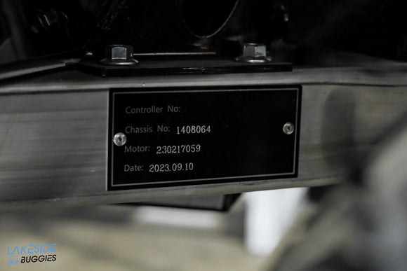 Metal identification plate.