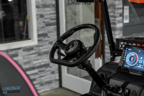 Black carbon fiber steering wheel.
