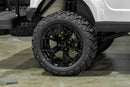 Black golf cart wheel.