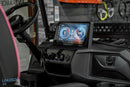 Golf cart dashboard with digital display.