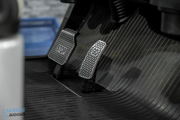 Golf cart pedals.
