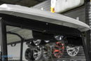 Golf cart roof with speakers.