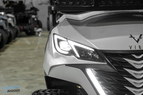 Modern white golf cart.