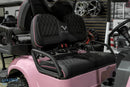 Pink and black golf cart seating.