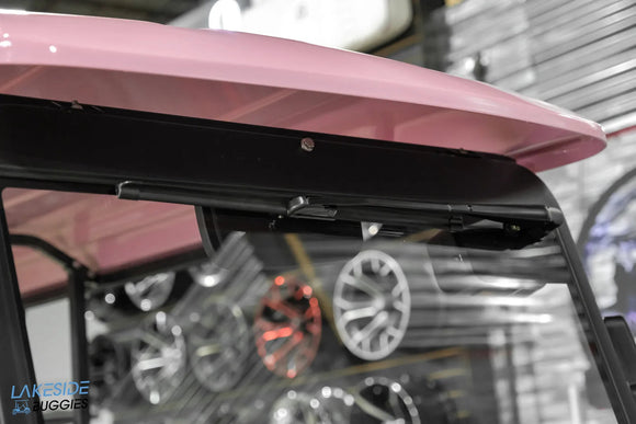 Pink golf cart roof.