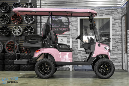 Pink lifted golf cart.
