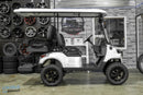 White lifted golf cart.