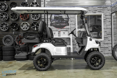 White lifted golf cart.