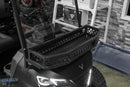 Black golf cart with front basket.
