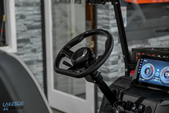 Black golf cart steering wheel.
