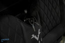 Black gaming chair with keys in pocket.