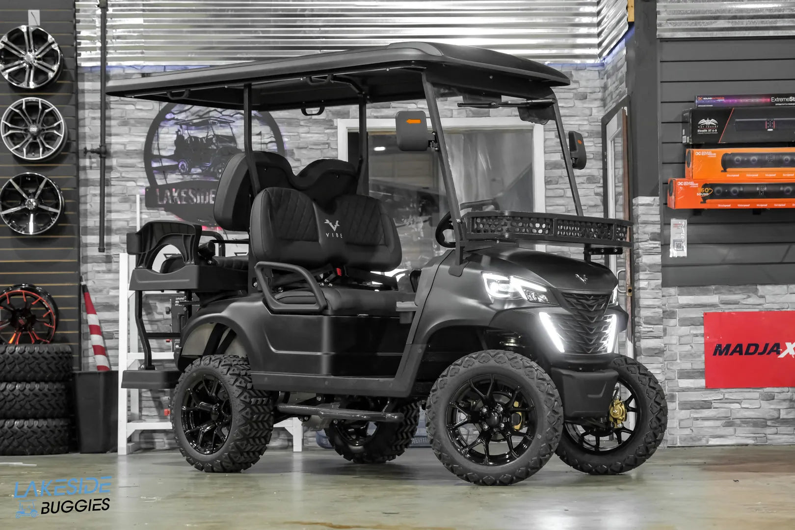 Black lifted golf cart.