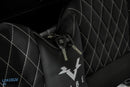 Black quilted chair with keys.