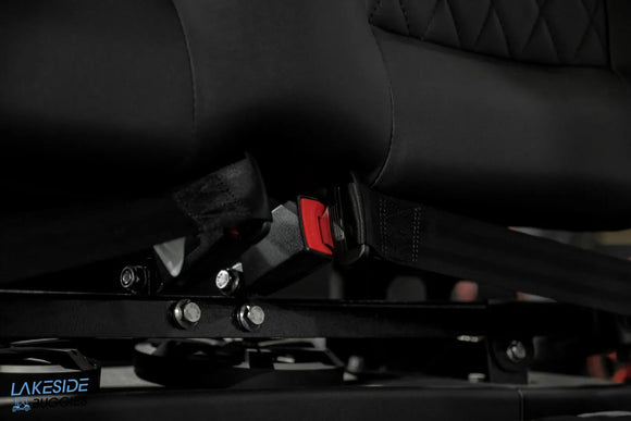 Black seat with seatbelt.