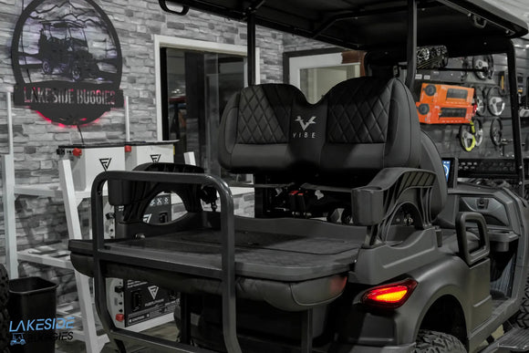Dark gray golf cart.