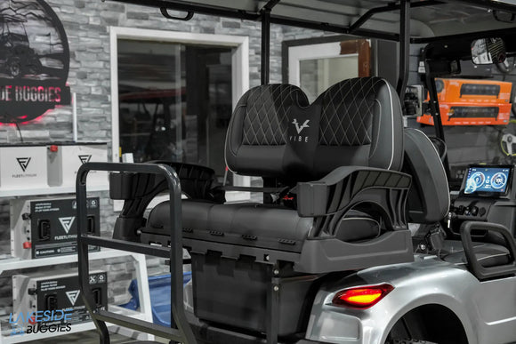 Gray golf cart seat.