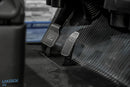 Metal pedals with textured surface.