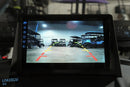 Rearview monitor displaying golf carts.