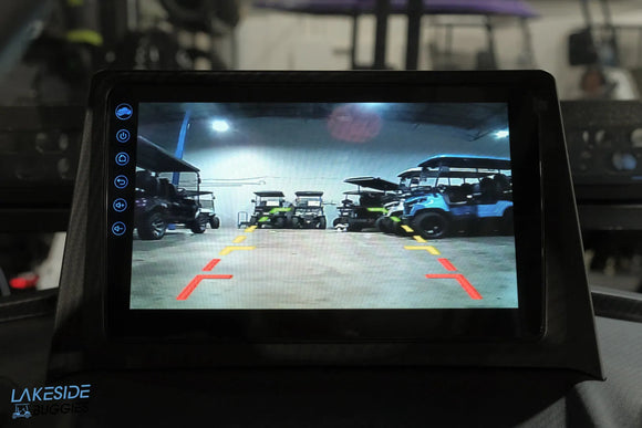 Rearview monitor displaying golf carts.