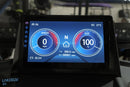 Vehicle dashboard display showing speed, battery state, and temperature.