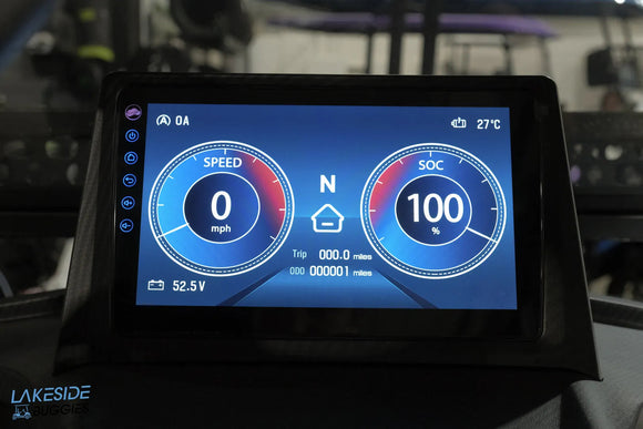 Vehicle dashboard display showing speed, battery state, and temperature.