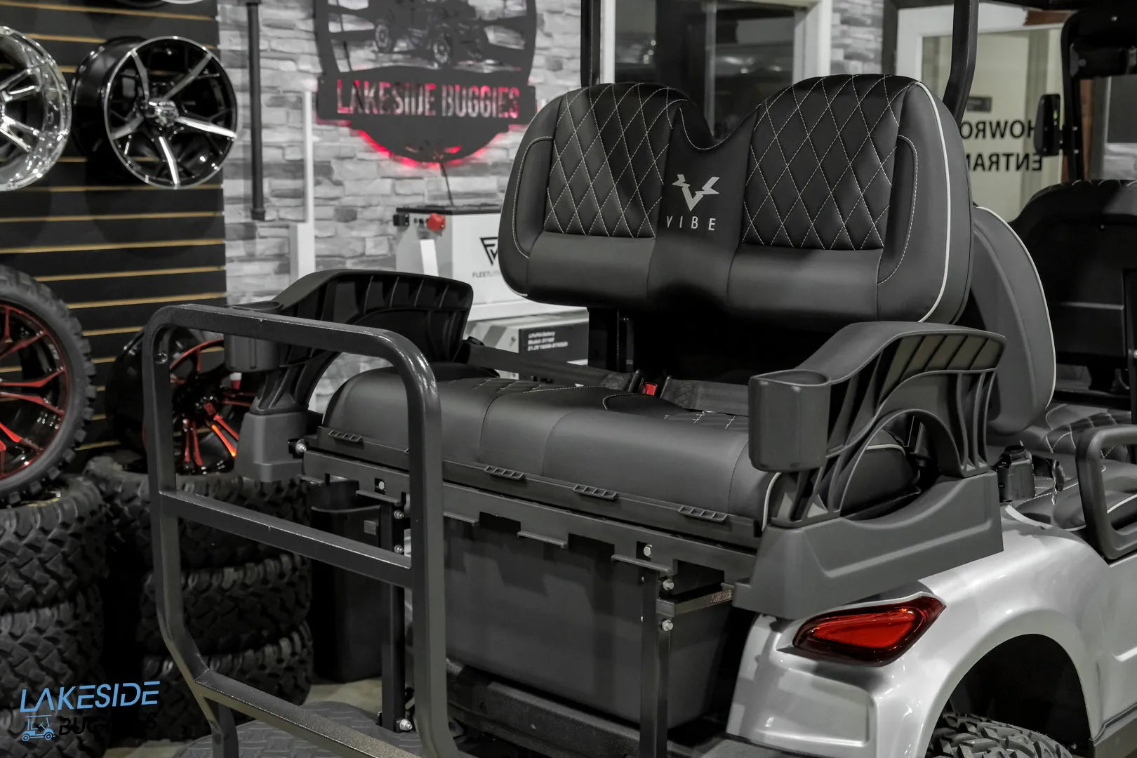 Black golf cart rear seat.