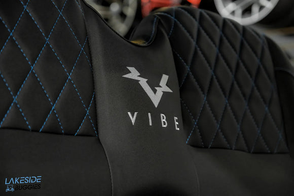 Black gaming chair with diamond stitching.