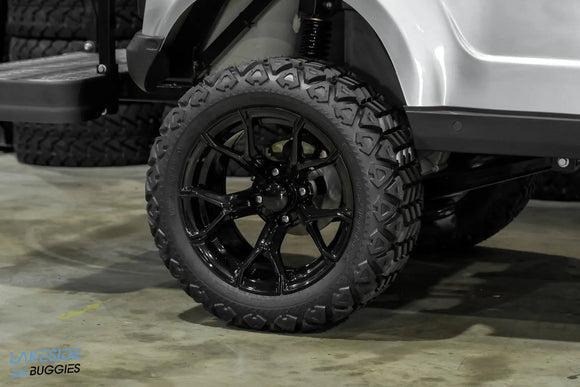 Black off-road tire and rim.