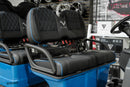Blue and black golf cart seats.