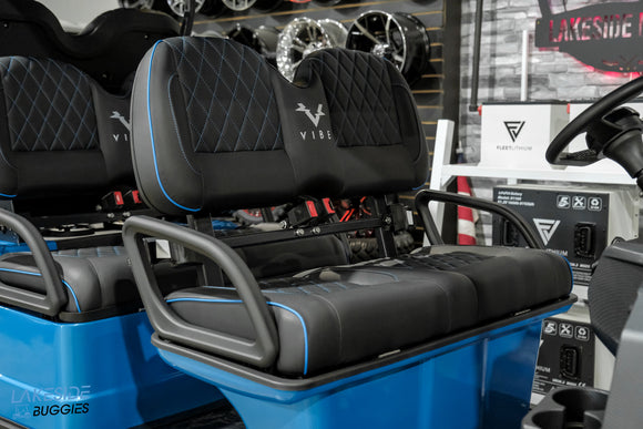Blue and black golf cart seats.