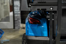 Blue golf cart rear with red taillight.