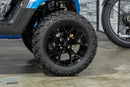 Black off-road tire and rim.