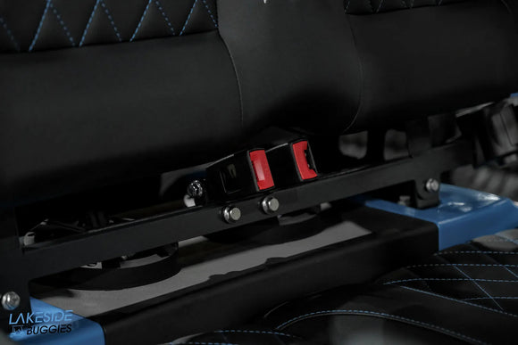 Black seat with seatbelts.