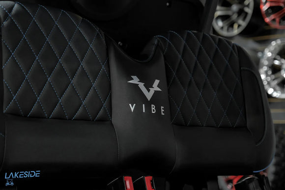 Black quilted golf cart seat.