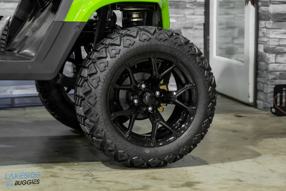Black off-road tire and rim.