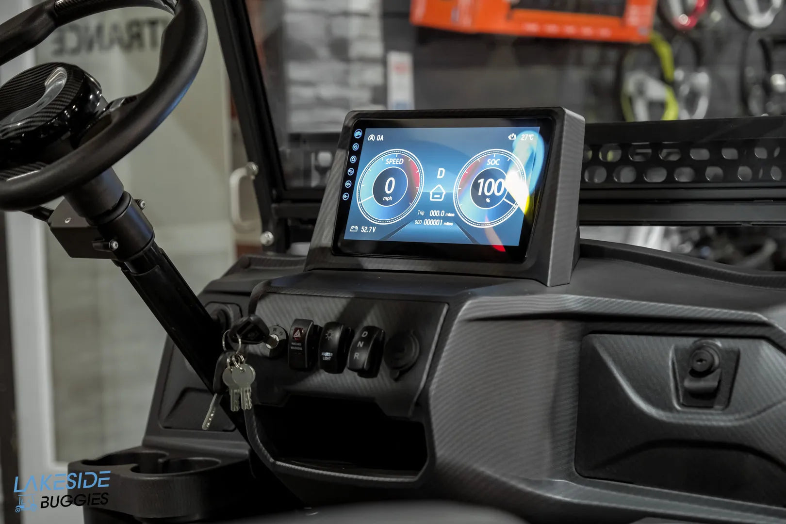 Golf cart dashboard with digital display.